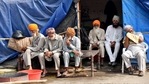 Farmers take rest during their ongoing protest against new farm laws at Singhu border, in Delhi on Tuesday.(ANI) Farmers take rest during their ongoing protest against new farm laws at Singhu border, in Delhi on Tuesday.(ANI)