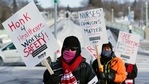 Nurses picket Friday, Feb. 12, 2021 in Faribault, Minn., during a healthcare worker protest of a shortage on protective masks.(AP Photo) Nurses picket Friday, Feb. 12, 2021 in Faribault, Minn., during a healthcare worker protest of a shortage on protective masks.(AP Photo)