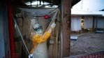 FILE - In this Saturday, July 13, 2019, file photo, a health worker wearing protective suit enters an isolation pod to treat a patient at a treatment center in Beni, Congo DRC. The World Health Organization and other partners said Tuesday Jan. 12, 2021, they are creating a global emergency stockpile of about 500,000 vaccines of Ebola vaccine to help stamp out any future outbreaks of the disease.(AP Photo/Jerome Delay, File)(AP) FILE - In this Saturday, July 13, 2019, file photo, a health worker wearing protective suit enters an isolation pod to treat a patient at a treatment center in Beni, Congo DRC. The World Health Organization and other partners said Tuesday Jan. 12, 2021, they are creating a global emergency stockpile of about 500,000 vaccines of Ebola vaccine to help stamp out any future outbreaks of the disease.(AP Photo/Jerome Delay, File)(AP)