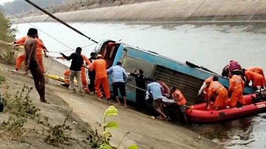 Rescuers take out the bus from the canal, in Sidhi district on Tuesday. (ANI Photo) Rescuers take out the bus from the canal, in Sidhi district on Tuesday. (ANI Photo)