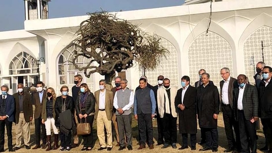 Foreign envoys, on their visit to Jammu and Kashmir, pose for photograph during their visit to the Hazratbal shrine in Srinagar. (ANI)