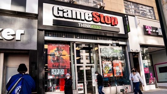 Pedestrians pass a GameStop store on 14th Street at Union Square,(AP)