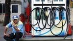 A petrol pump attendant waits for customers as national petrol and diesel prices rise at Bharat Petroleum Fuel Station, in New Delhi.(ANI) A petrol pump attendant waits for customers as national petrol and diesel prices rise at Bharat Petroleum Fuel Station, in New Delhi.(ANI)