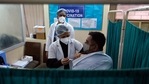 A healthcare workers administering vaccine for coronavirus.(Bloomberg) A healthcare workers administering vaccine for coronavirus.(Bloomberg)