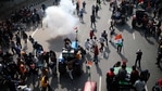 Police use tear gas to disperse farmers who marched to the capital during India's Republic Day celebrations in New Delhi, India on Jan.26, 2021. (AP) Police use tear gas to disperse farmers who marched to the capital during India's Republic Day celebrations in New Delhi, India on Jan.26, 2021. (AP)