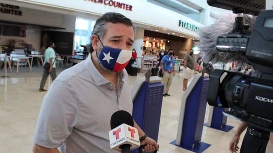 US Senator Ted Cruz (R-TX) speaks to the media at the Cancun International Airport before boarding his plane back to the US, in Cancun, Mexico.(Reuters)