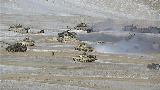 This undated handout photograph released by the Indian Army on February 16 shows People Liberation Army soldiers and tanks during military disengagement along the Line of Actual Control in Ladakh. (AFP)