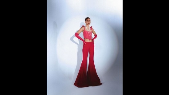 Designer Prabal Gurung mixes reds and pinks like a potent cocktail in his AW21 outing (Photo: Instagram/PrabalGurung) Designer Prabal Gurung mixes reds and pinks like a potent cocktail in his AW21 outing (Photo: Instagram/PrabalGurung)
