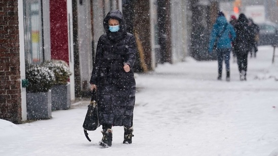 Over the past two weeks, the daily averages for both coronavirus cases and deaths have dropped by about half in the US, according to data from Johns Hopkins University.(AP)