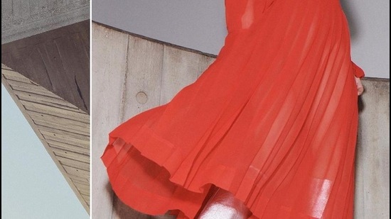 A red pleated dress by Victoria Beckham AW 21 recently showcased at NYFW (Photo: Instagram/VictoriaBeckham)