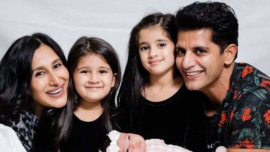 Karanvir Bohra and Teejay Sidhu with their three daughters. 