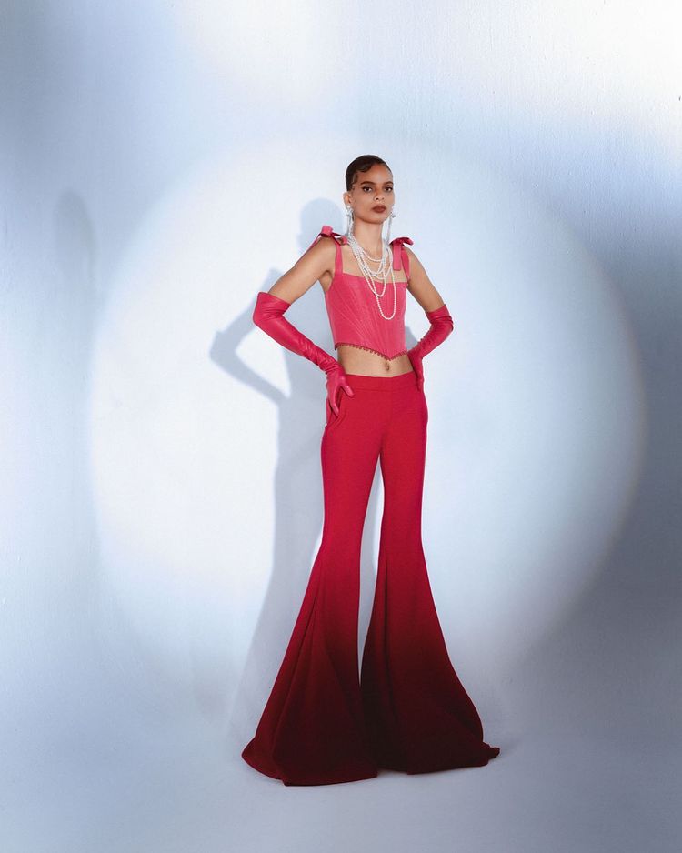 Designer Prabal Gurung mixes reds and pinks like a potent cocktail in his AW21 outing (Photo: Instagram/PrabalGurung) Designer Prabal Gurung mixes reds and pinks like a potent cocktail in his AW21 outing (Photo: Instagram/PrabalGurung)