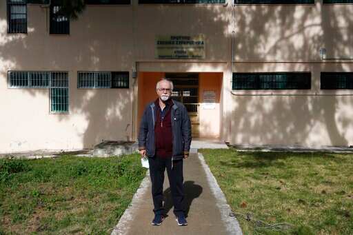 Prison school director Petros Damianos poses outside the building of Avlonas prison school, north of Athens.(AP) Prison school director Petros Damianos poses outside the building of Avlonas prison school, north of Athens.(AP)