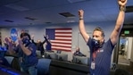 Members of NASA’s Perseverance rover team react in mission control after receiving confirmation the spacecraft successfully touched down on Mars.(via REUTERS)