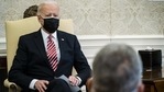 US President Joe Biden wears a protective mask during a meeting in the Oval Office of the White House in Washington, DC, US, on Wednesday, Feb. 17, 2021. (Bloomberg) US President Joe Biden wears a protective mask during a meeting in the Oval Office of the White House in Washington, DC, US, on Wednesday, Feb. 17, 2021. (Bloomberg)