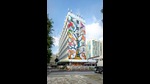 The work, painted on the facade of a hotel in Little India, represents the interconnectedness of India and Singapore, of Man and Nature, and the idea of art as healer. (Kevin Tan / St+art) The work, painted on the facade of a hotel in Little India, represents the interconnectedness of India and Singapore, of Man and Nature, and the idea of art as healer. (Kevin Tan / St+art)