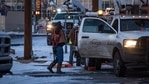 Oncor apprentice lineman Brendan Waldon puts on a safety harness as he prepares to go up in a bucket to repair a utility pole that was damaged by the winter storm that passed through Texas Thursday. (AP Photo ) Oncor apprentice lineman Brendan Waldon puts on a safety harness as he prepares to go up in a bucket to repair a utility pole that was damaged by the winter storm that passed through Texas Thursday. (AP Photo )