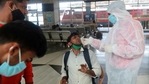A health worker takes a swab sample of a passenger at Bandra train station in Mumbai, India, Wednesday, Feb. 17, 2021. Health officials have detected a spike in COVID-19 cases in several pockets of Maharashtra state, including in Mumbai, the country's financial capital. (AP Photo/Rafiq Maqbool)(AP) A health worker takes a swab sample of a passenger at Bandra train station in Mumbai, India, Wednesday, Feb. 17, 2021. Health officials have detected a spike in COVID-19 cases in several pockets of Maharashtra state, including in Mumbai, the country's financial capital. (AP Photo/Rafiq Maqbool)(AP)
