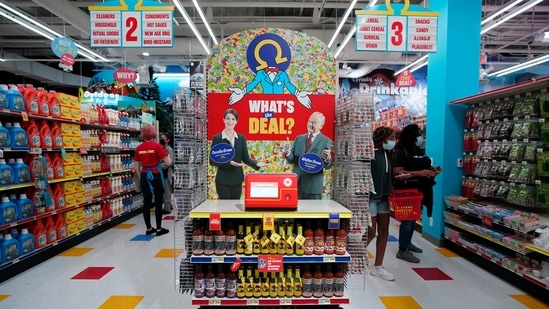 People walk through Omega Mart, an immersive art installation by arts production company Meow Wolf, Thursday, Feb. 18, 2021, in Las Vegas.(AP)