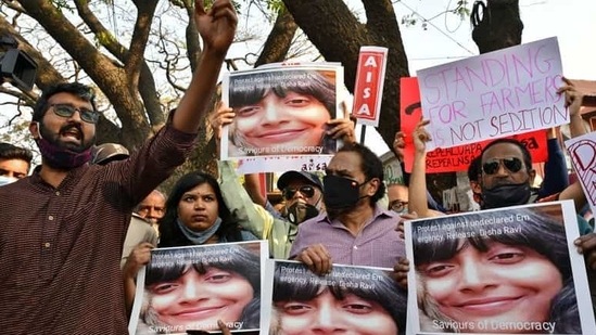People hold placards during a protest against the arrest of climate activist Disha Ravi, in Bengaluru on February 15, 2021. (Reuters File Photo )