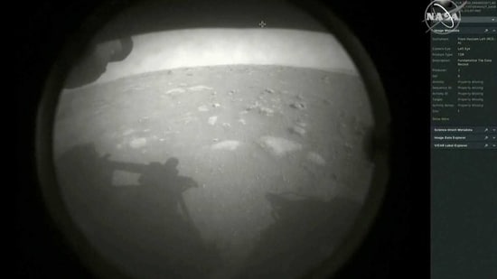 The first images arrive moments after NASA's Perseverance Mars roverspacecraft successfully touched down on Mars, at NASA's Jet Propulsion Laboratory in Pasadena, California, US.(NASA TV via Reuters)