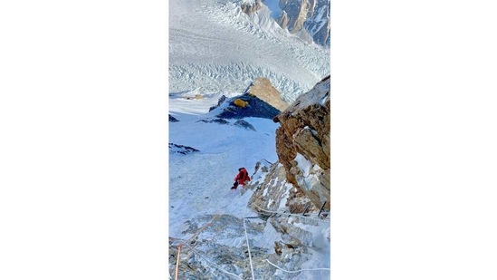 “My feet were cold and I really thought that I would have to cut off my toes,” Mingma Gyalje says of the final ascent. “At one point, I couldn’t take it anymore and was ready to quit. When I reached out to my teammates higher up, their radios were fortunately off. I had no choice but to continue going up.”(Courtesy Mingma Gyalje Sherpa)