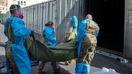 US National Guard members assisting with processing Covid-19 deaths. (File Photo / AP) US National Guard members assisting with processing Covid-19 deaths. (File Photo / AP)