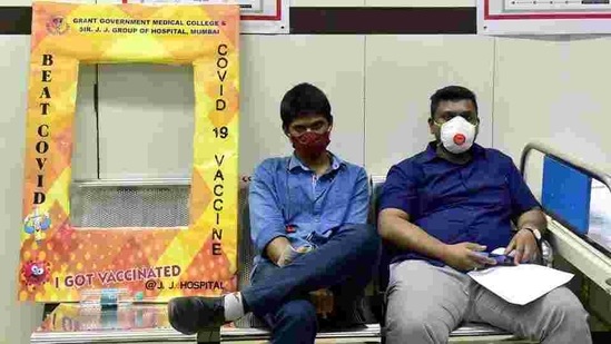 Beneficiaries wait in an observation area after getting Covid-19 vaccine at Sir JJ Hospital in Mumbai on Thursday. (Anshuman Poyrekar/HT Photo) Beneficiaries wait in an observation area after getting Covid-19 vaccine at Sir JJ Hospital in Mumbai on Thursday. (Anshuman Poyrekar/HT Photo)