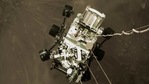 NASA's Perseverance rover descends to touch down on Mars in a still image from a video camera aboard the descent stage taken February 18, 2021.(NASA via REUTERS)