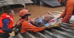 Indonesia's National Search and Rescue Agency shows rescue personnel evacuating an elderly resident from a flooded area in Jakarta.(AFP) Indonesia's National Search and Rescue Agency shows rescue personnel evacuating an elderly resident from a flooded area in Jakarta.(AFP)