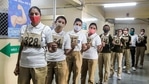 Women police personnel wait in a queue to get the first shot of Covid-19 vaccine at a vaccination centre at Civil Hospital, in Ahmedabad on Sunday.(PTI Photo) Women police personnel wait in a queue to get the first shot of Covid-19 vaccine at a vaccination centre at Civil Hospital, in Ahmedabad on Sunday.(PTI Photo)