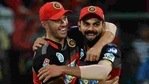 RCB captain Virat Kohli with AB de Villiers. (File)(AFP) RCB captain Virat Kohli with AB de Villiers. (File)(AFP)