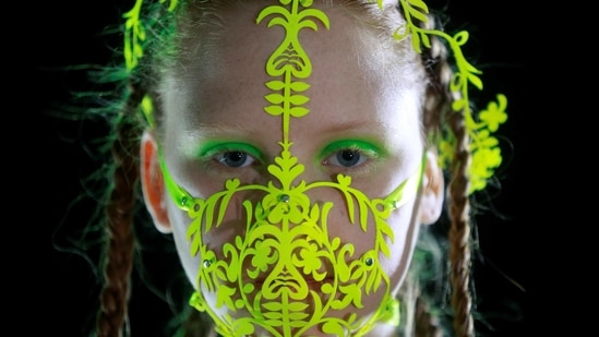 A model waits backstage at Ukrainian Fashion Week in Kyiv, Ukraine February 7, 2021. (REUTERS)
