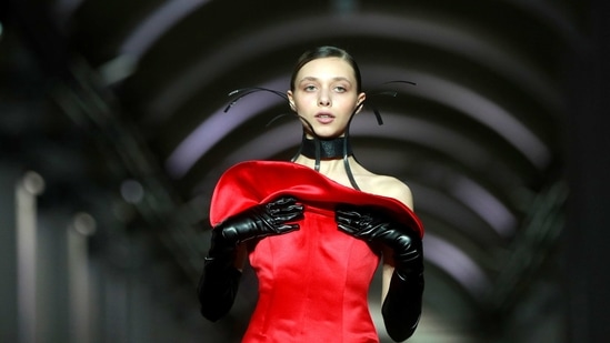 A model presents a creation by Lviv Fashion School clothing design graduates during Ukrainian Fashion Week in Kyiv, Ukraine February 7, 2021.  (REUTERS)