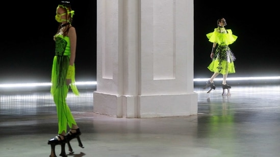 Models present creations by designer Polina Veller during Ukrainian Fashion Week in Kyiv, Ukraine February 7, 2021.  (REUTERS)