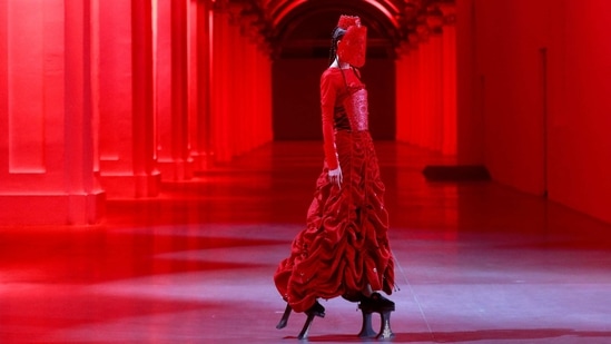 A model presents a creation by designer Polina Veller during Ukrainian Fashion Week in Kyiv, Ukraine February 7, 2021.  (REUTERS)