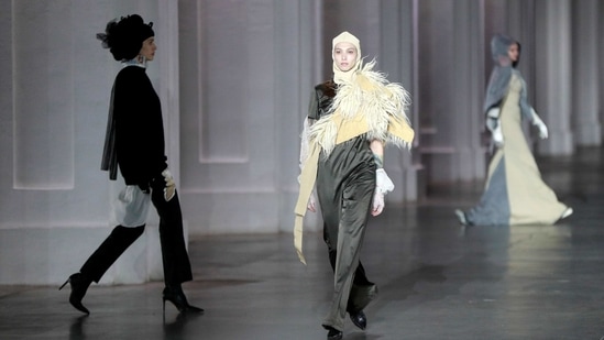 Models present creations by brand Gaptuvalnya during Ukrainian Fashion Week in Kyiv, Ukraine February 7, 2021.  (REUTERS)