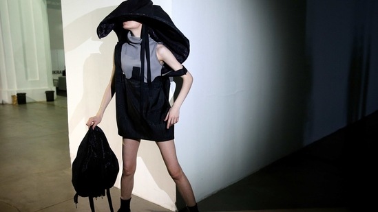 A model waits backstage at Ukrainian Fashion Week in Kyiv, Ukraine February 7, 2021.  (REUTERS)