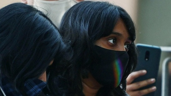 Activist Disha Ravi at a Delhi court on Friday.(ANI Photo) Activist Disha Ravi at a Delhi court on Friday.(ANI Photo)