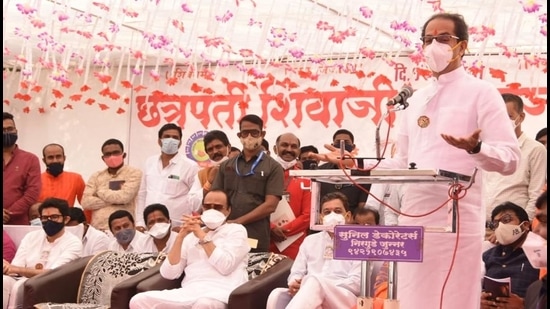 Maharashtra chief minister Uddhav Thackeray speaking at a function organised to celebrate the birth anniversary of Chhatrapati Shivaji Maharaj at Shivneri fort in Pune, on Friday. Also seen are deputy chief minister Ajit Pawar (second left) and state tourism minister Aaditya Thackeray (left). (HT PHOTO)