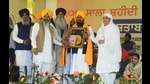 Akal Takht acting jathedar Giani Harpreet Singh being honoured at Godharpura village in Gurdaspur district during a function to mark Nankana Sahib massacre centenary on Sunday. (HT photo) Akal Takht acting jathedar Giani Harpreet Singh being honoured at Godharpura village in Gurdaspur district during a function to mark Nankana Sahib massacre centenary on Sunday. (HT photo)