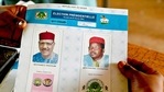 A voter holds a ballot paper with images of the two candidates at a polling station in Niamey on February 21, 2021 during Niger's second round of the presidential election. - Niger is the world's poorest nation, according to the UN's benchmark of development of 189 countries. (AFP) A voter holds a ballot paper with images of the two candidates at a polling station in Niamey on February 21, 2021 during Niger's second round of the presidential election. - Niger is the world's poorest nation, according to the UN's benchmark of development of 189 countries. (AFP)