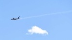 A United Airlines plane with smoke trailing from its right side is seen heading east towards Denver International Airport, Saturday,(AP) A United Airlines plane with smoke trailing from its right side is seen heading east towards Denver International Airport, Saturday,(AP)