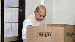 Polling for municipal corporations in six major cities of Gujarat began on Sunday at 7 am. In picture - Amit Shah casts his vote at Naranpura Sub Zonal Office in Ahmedabad.(PTI)