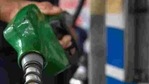 A petrol pump employee pours petrol into a vehicle at a fuel station in Mumbai.(PTI Photo)