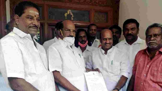 Congress MLA K Lakshminarayanan hands over his resignation letter to Puducherry Assembly speaker VP Sivakozhundu, in Puducherry on Sunday. (ANI Photo)