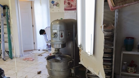 Water damage from burst pipes at a local bakery in Baytown, Texas, U.S., on Saturday, Feb. 20, 2021. Restaurants in Texas are throwing out expired food, grocery stores are closing early.(Bloomberg) Water damage from burst pipes at a local bakery in Baytown, Texas, U.S., on Saturday, Feb. 20, 2021. Restaurants in Texas are throwing out expired food, grocery stores are closing early.(Bloomberg)