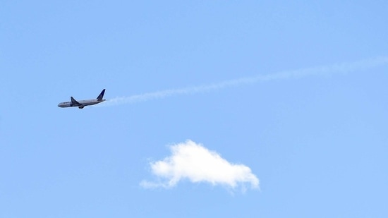 A United Airlines plane with smoke trailing from its right side is seen heading east towards Denver International Airport, Saturday, (AP) A United Airlines plane with smoke trailing from its right side is seen heading east towards Denver International Airport, Saturday, (AP)