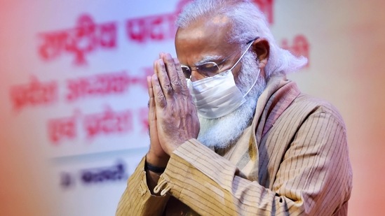 Prime Minister Narendra Modi inaugurates a meeting of the BJP national office bearers at the NDMC convention centre in New Delhi, Sunday(PTI)