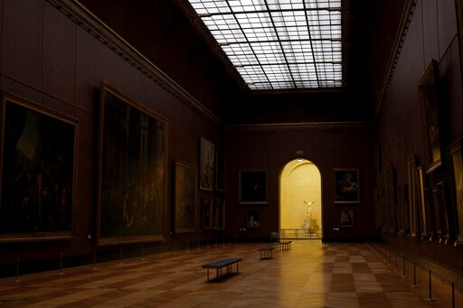 The sculpture The Victory of Samothrace is seen in a deserted Louvre museum, in Paris.(AP) The sculpture The Victory of Samothrace is seen in a deserted Louvre museum, in Paris.(AP)